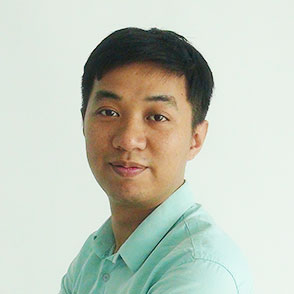 Young Asian man with short black hair wearing a light blue shirt
