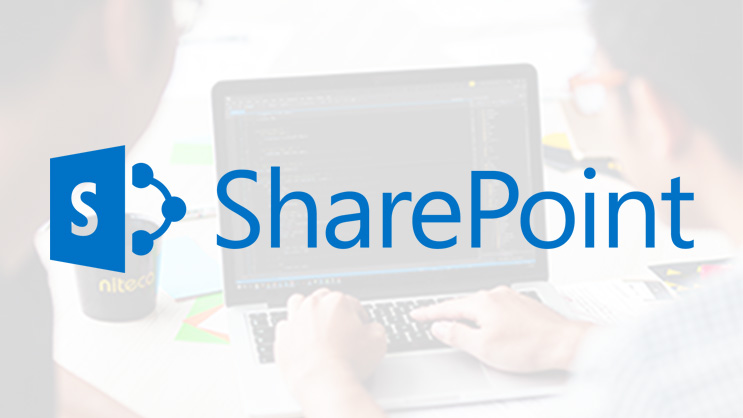 SharePoint logo overlaying a developer coding on a laptop screen
