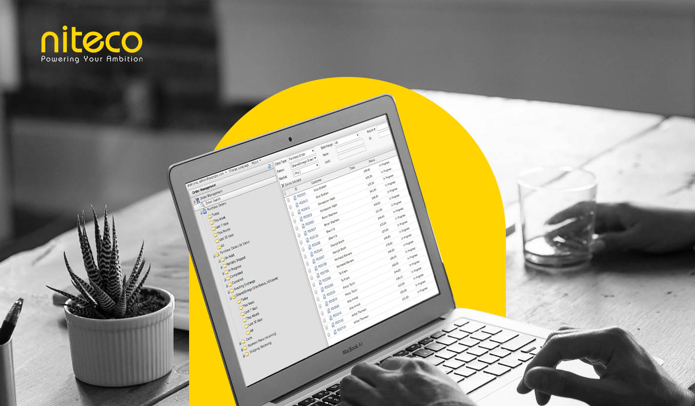 Niteco software displaying order management system on laptop screen
