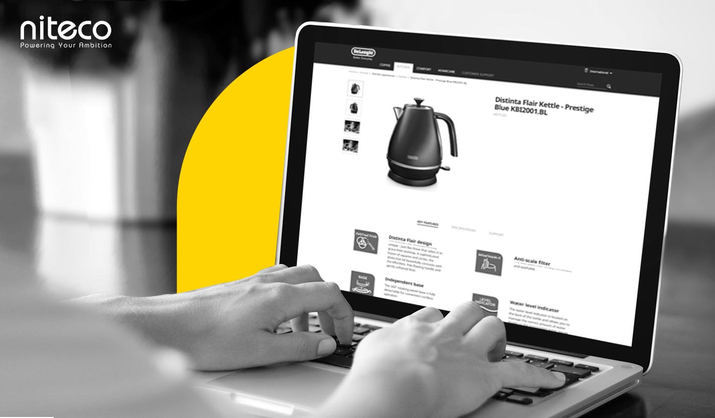 Hands browsing electric kettle product page on Niteco online store webpage