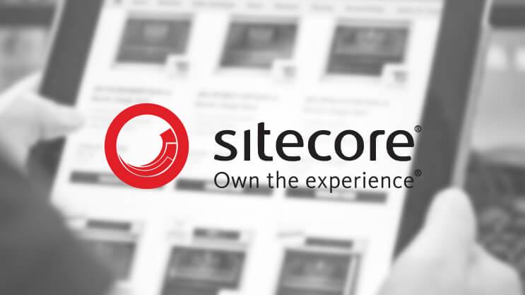 Sitecore logo over a blurred digital content management interface on a tablet