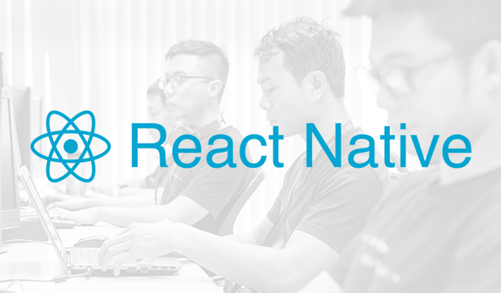 React Native logo overlaying developers focused on coding projects at laptops